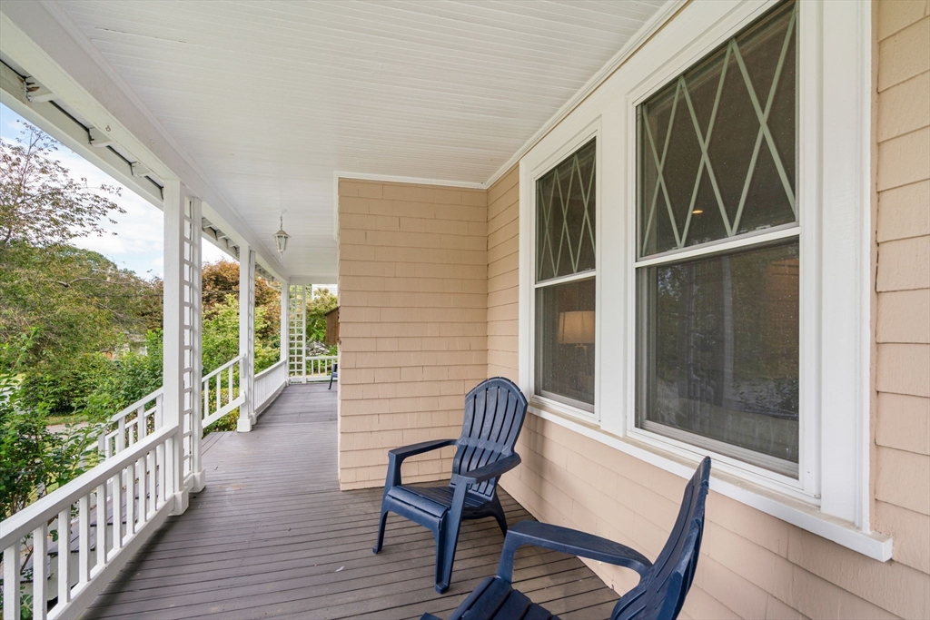44 Norfolk Street Needham, MA 02492 - Photo 3 of 28 a view of two chairs in the balcony