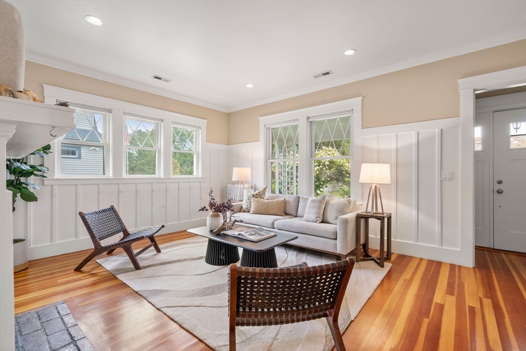 44 Norfolk Street Needham, MA 02492 - Photo 7 of 28 a living room with furniture and a wooden floor