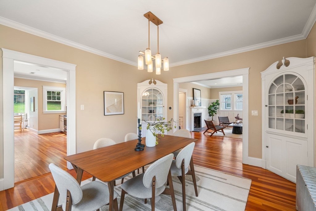 44 Norfolk Street Needham, MA 02492 - Photo 9 of 28 a view of a dining room with furniture and wooden floor