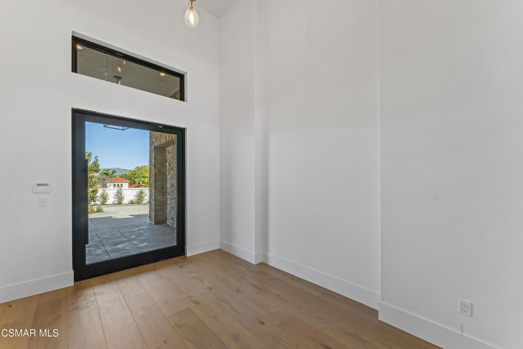 532 Corte Corrida Camarillo, CA 93010 - Photo 11 of 76 a view of a hallway view with wooden floor and bedroom