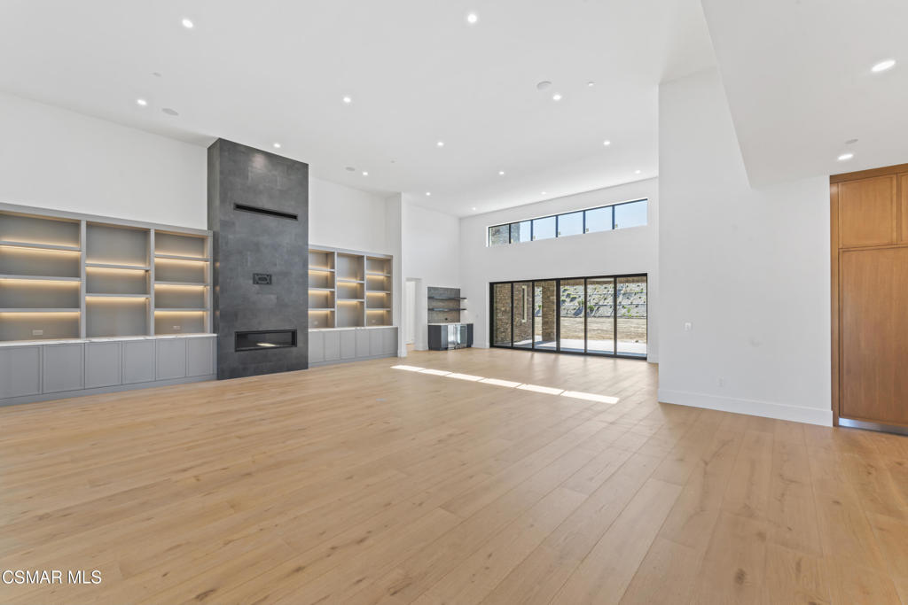 532 Corte Corrida Camarillo, CA 93010 - Photo 21 of 76 a view of an empty room with a window and fireplace