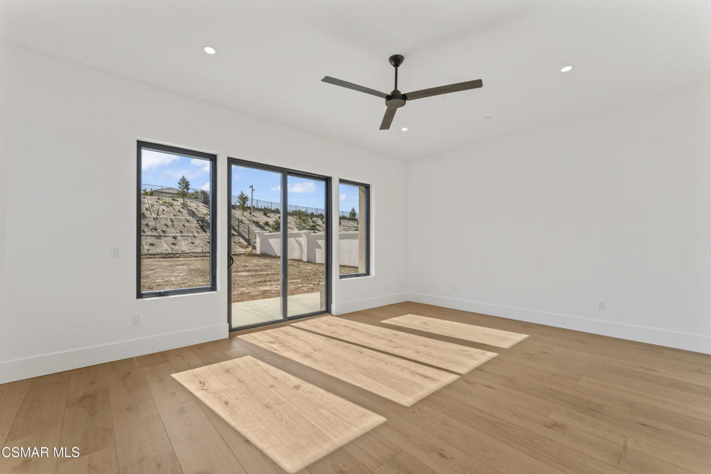 532 Corte Corrida Camarillo, CA 93010 - Photo 31 of 76 a view of a livingroom with a ceiling fan and window
