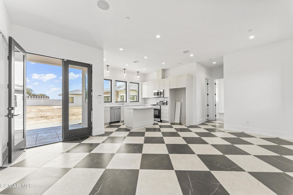 532 Corte Corrida Camarillo, CA 93010 - Photo 44 of 76 a black and white checkered floor with a black white checkered floor next to a large window