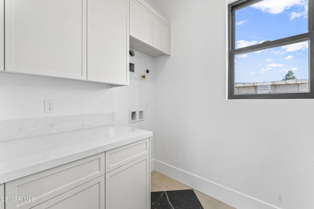 532 Corte Corrida Camarillo, CA 93010 - Photo 52 of 76 a view of storage and utility room with washer and dryer