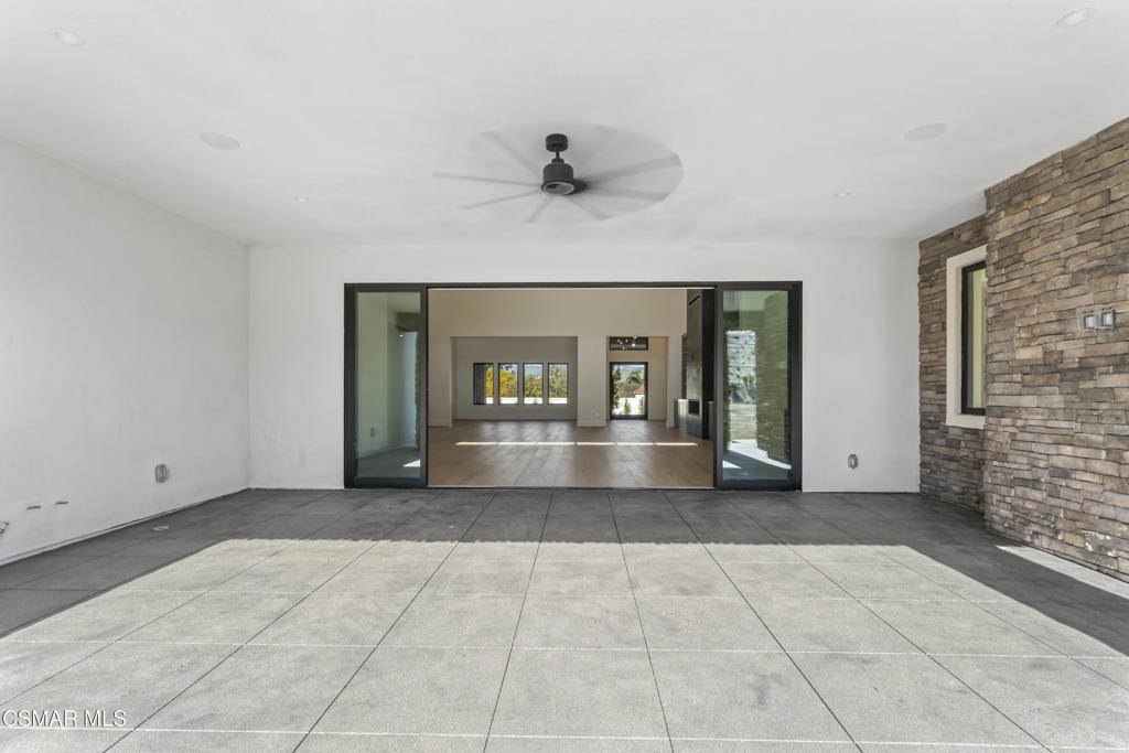 532 Corte Corrida Camarillo, CA 93010 - Photo 58 of 76 a view of entrance and hall with a fireplace