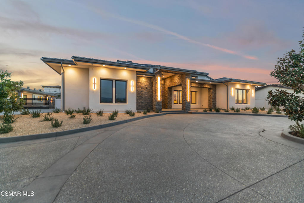 532 Corte Corrida Camarillo, CA 93010 - Photo 64 of 76 a view of a house with many windows and yard