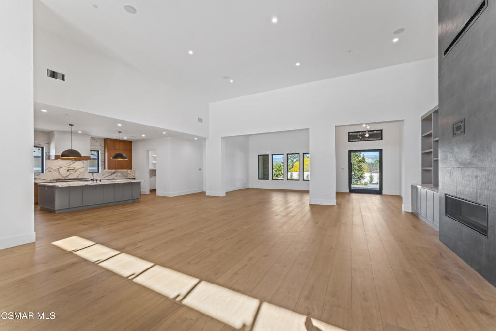 532 Corte Corrida Camarillo, CA 93010 - Photo 10 of 76 a view of an empty room with window and wooden floor