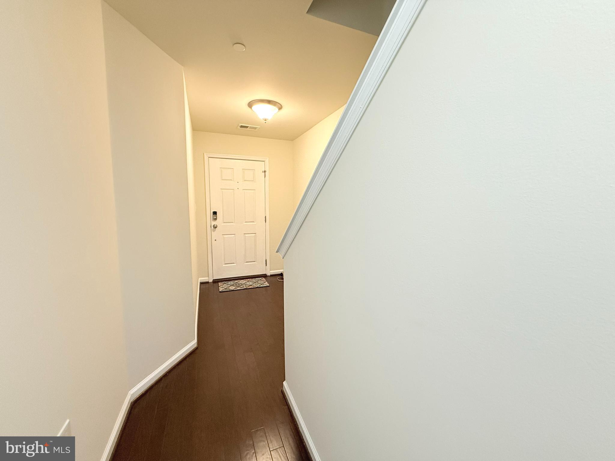 6082 Forum Square Frederick, MD 21703 - Photo 13 of 63 a view of a hallway with stairs