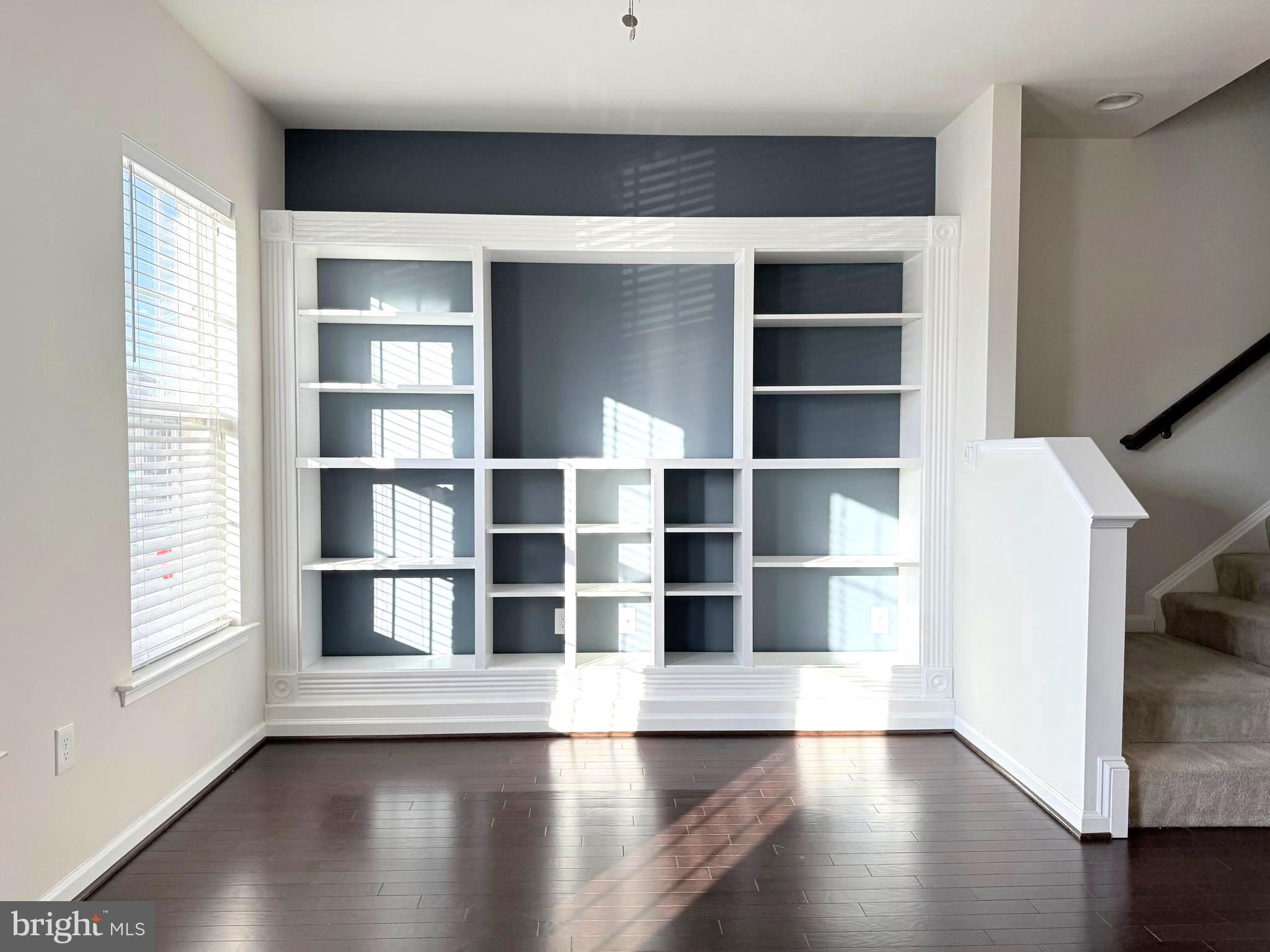 6082 Forum Square Frederick, MD 21703 - Photo 30 of 63 a view of wooden floor and windows in a room