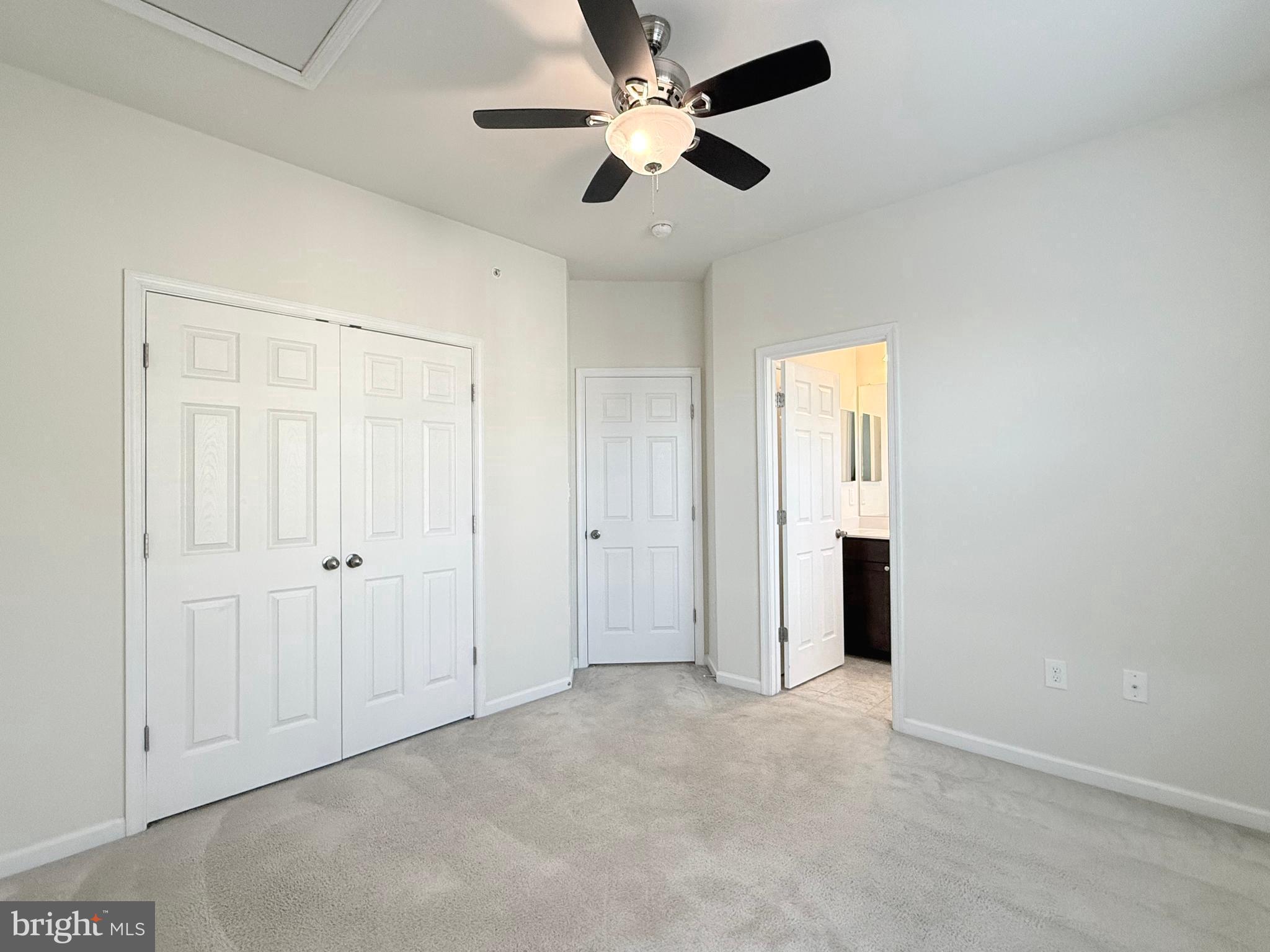 6082 Forum Square Frederick, MD 21703 - Photo 34 of 63 an empty room with closet and windows