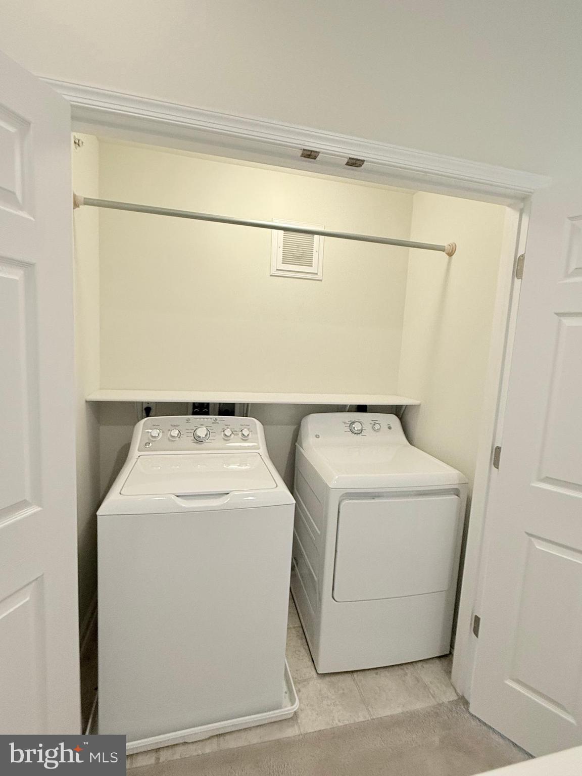 6082 Forum Square Frederick, MD 21703 - Photo 41 of 63 a utility room with dryer and washer
