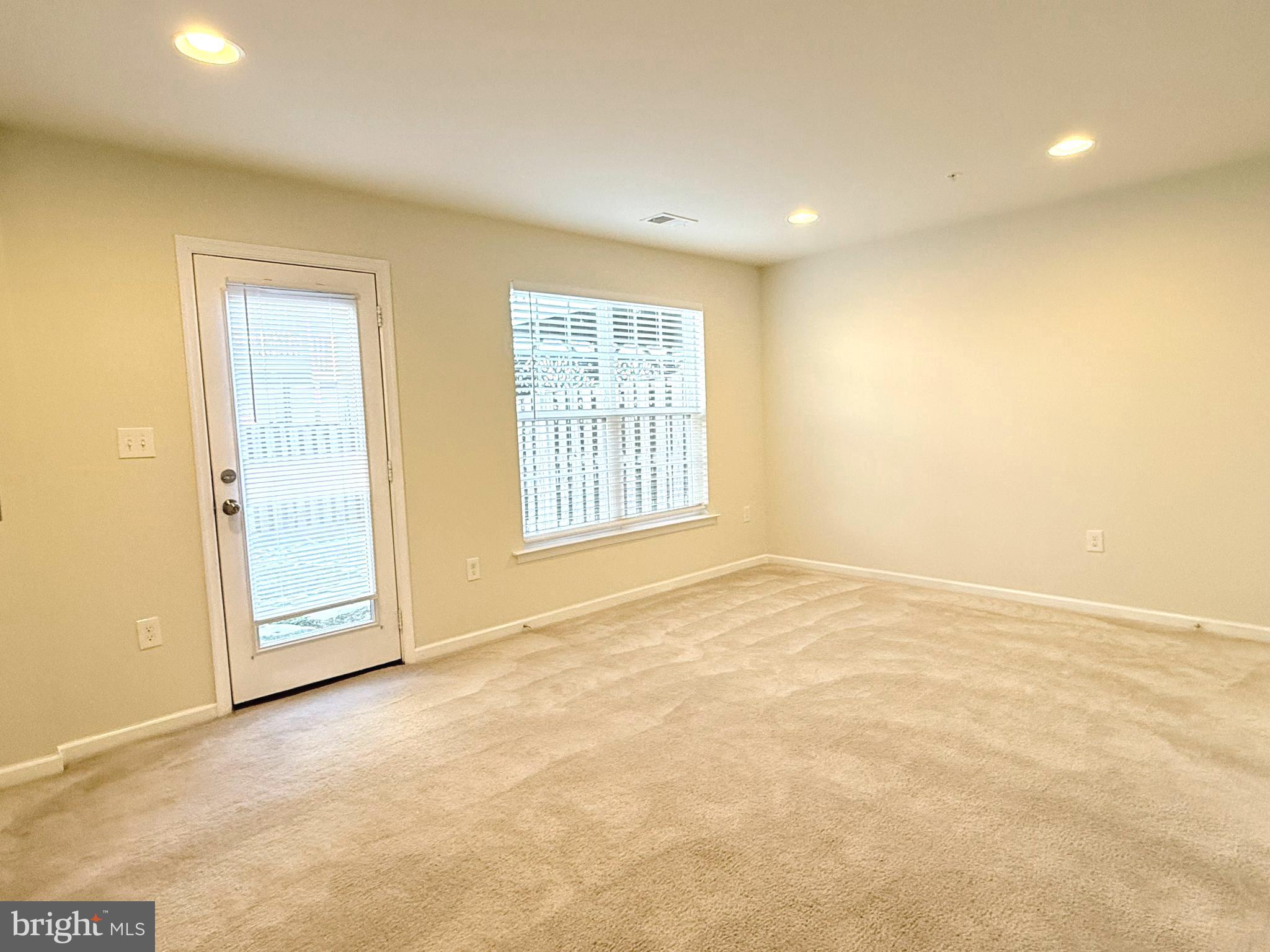 6082 Forum Square Frederick, MD 21703 - Photo 7 of 63 a view of an empty room with a window