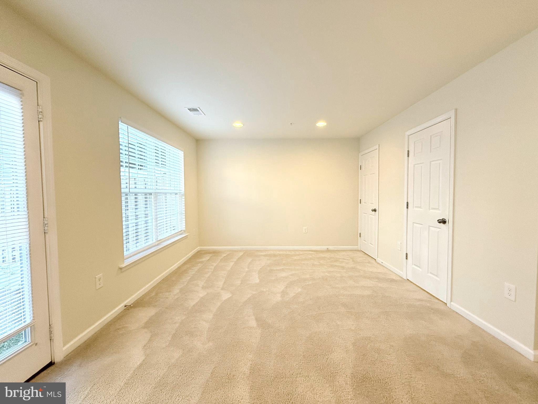 6082 Forum Square Frederick, MD 21703 - Photo 8 of 63 a view of an empty room with a window