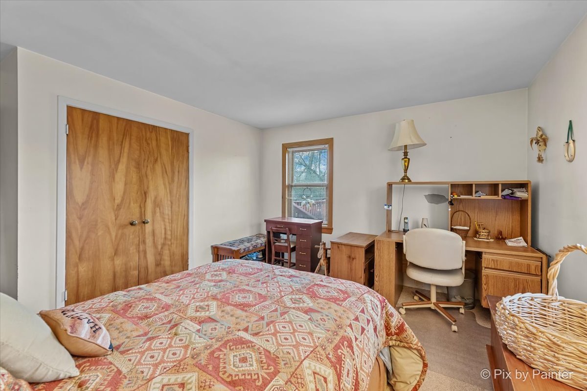 612-3 Three Oaks Road Cary, IL 60013 - Photo 19 of 48 a bedroom with a bed and dresser with chair