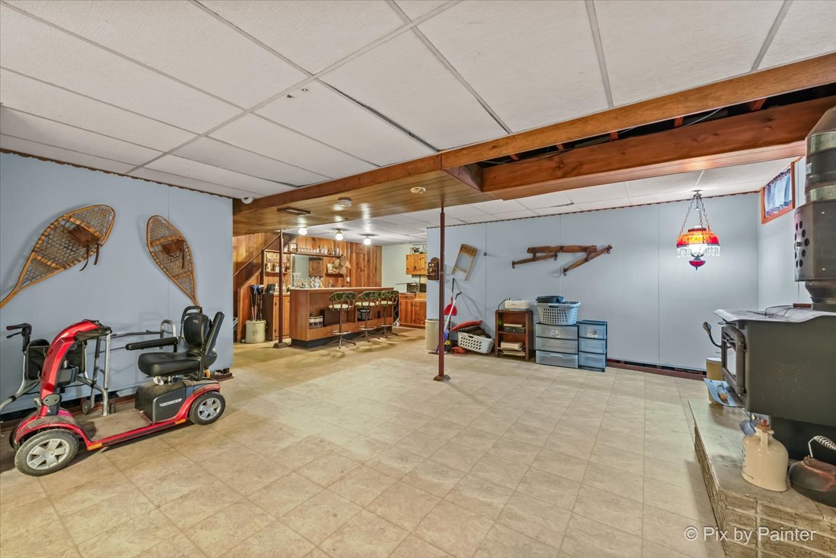 612-3 Three Oaks Road Cary, IL 60013 - Photo 25 of 48 a view of a garage with rack and bicycle