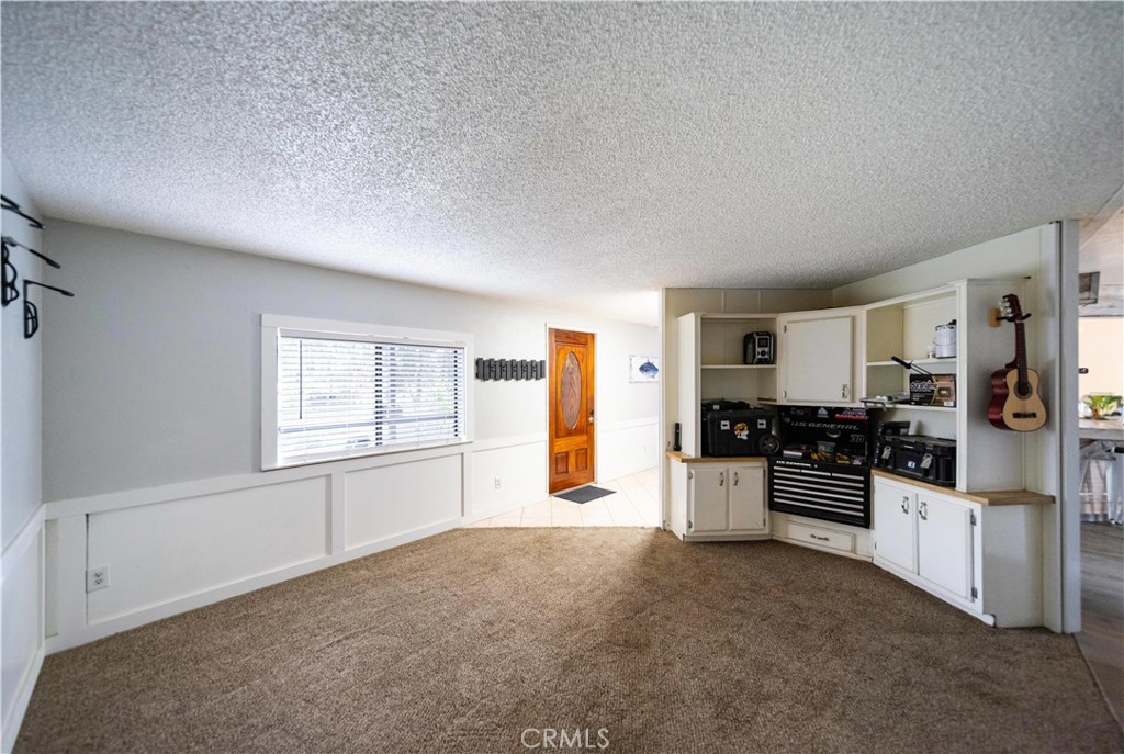 33671 The Farm Road Wildomar, CA 92595 - Photo 23 of 73 a large kitchen with cabinets and stainless steel appliances