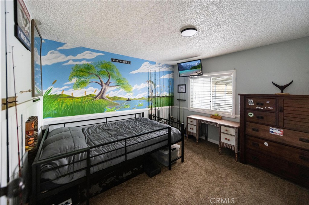 33671 The Farm Road Wildomar, CA 92595 - Photo 30 of 73 a bed room with a bed and a window