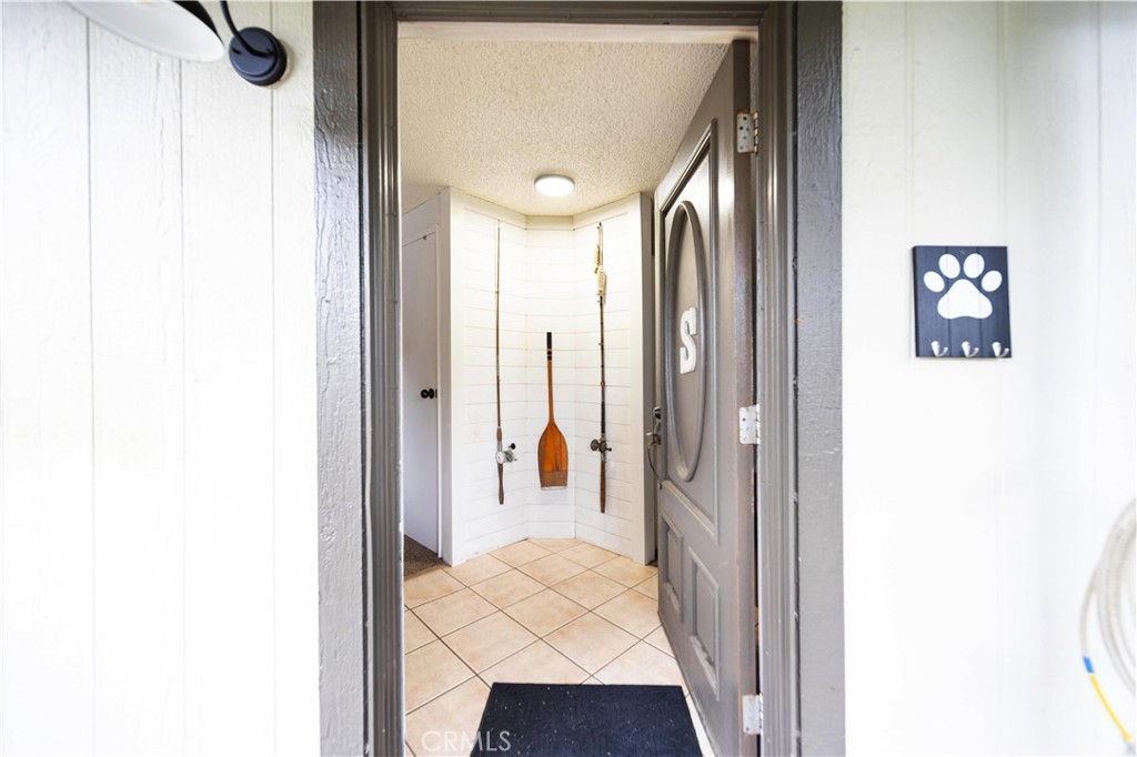 33671 The Farm Road Wildomar, CA 92595 - Photo 7 of 73 a view of a hallway with wooden floor