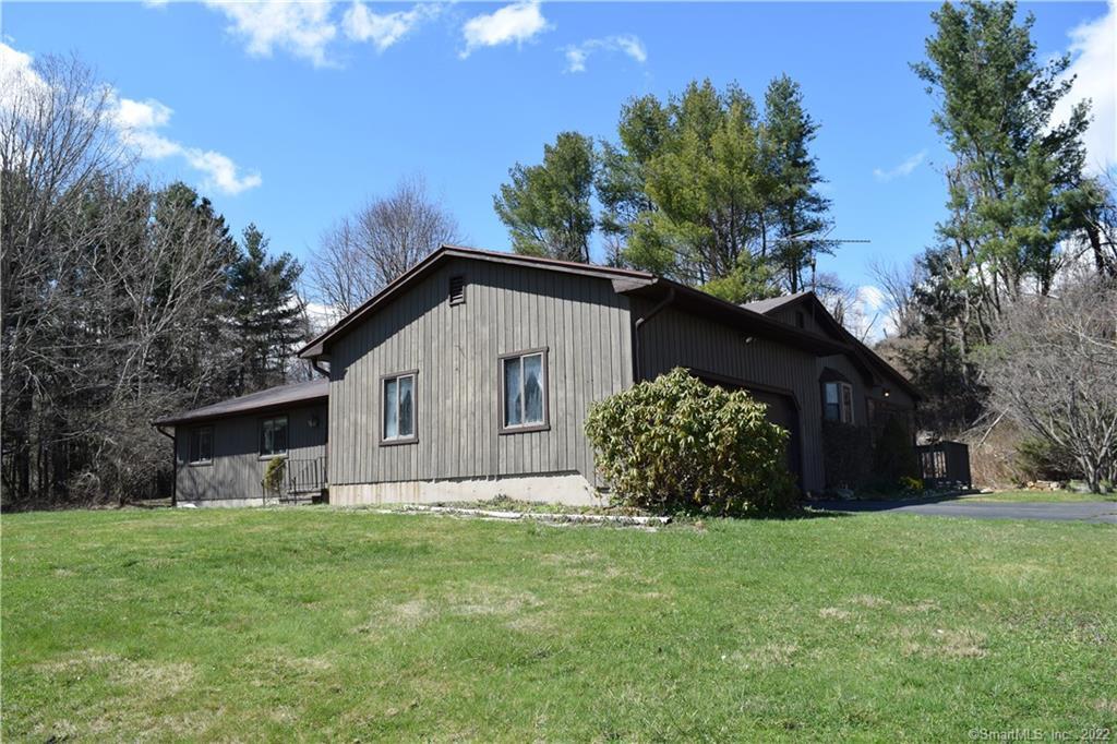 28 Munn Road Southbury, CT 06488 - Photo 1 of 1 a view of a house with a yard
