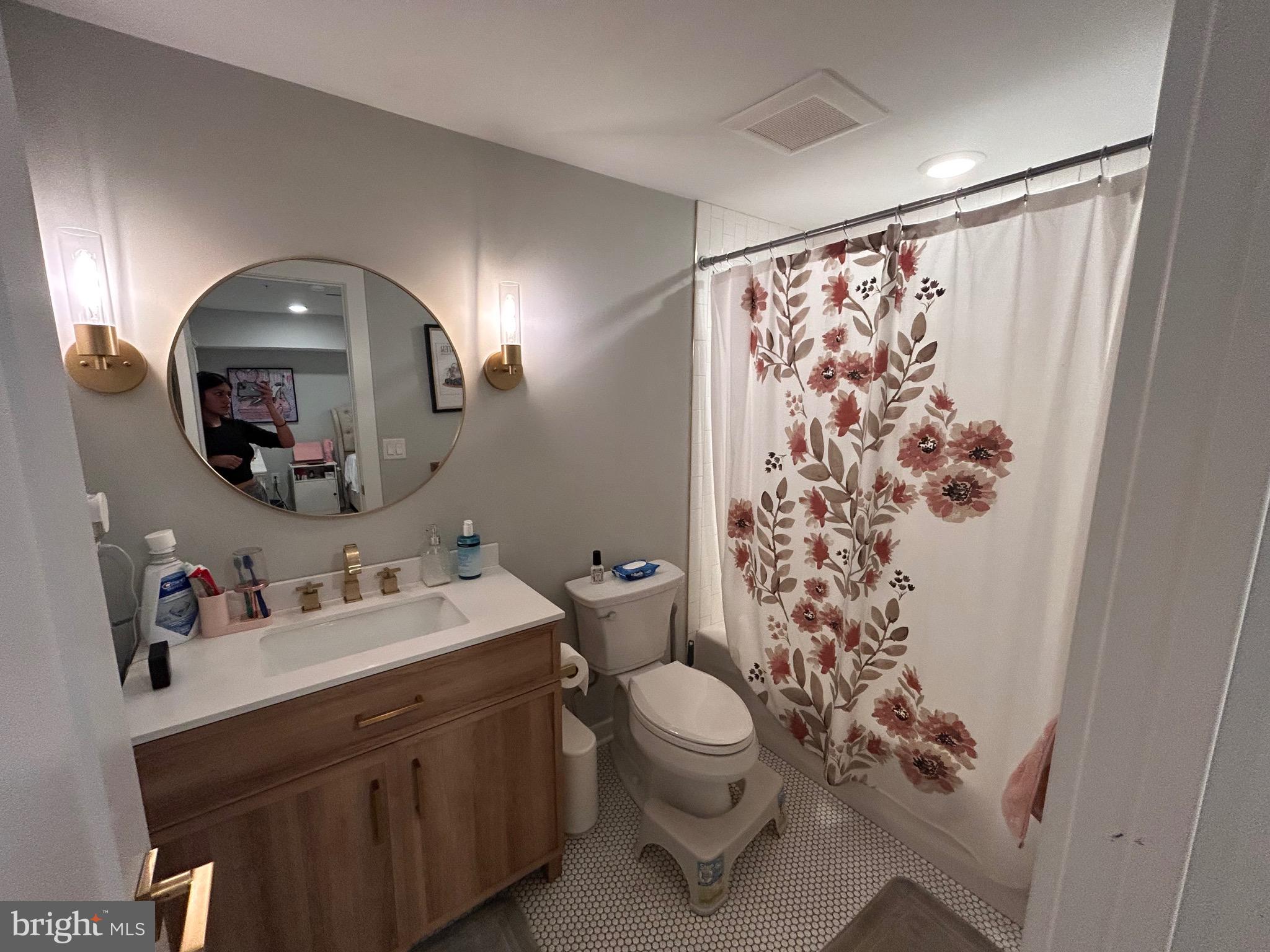 5830 Henry Philadelphia, PA 19128 - Photo 7 of 9 a bathroom with a sink toilet and shower