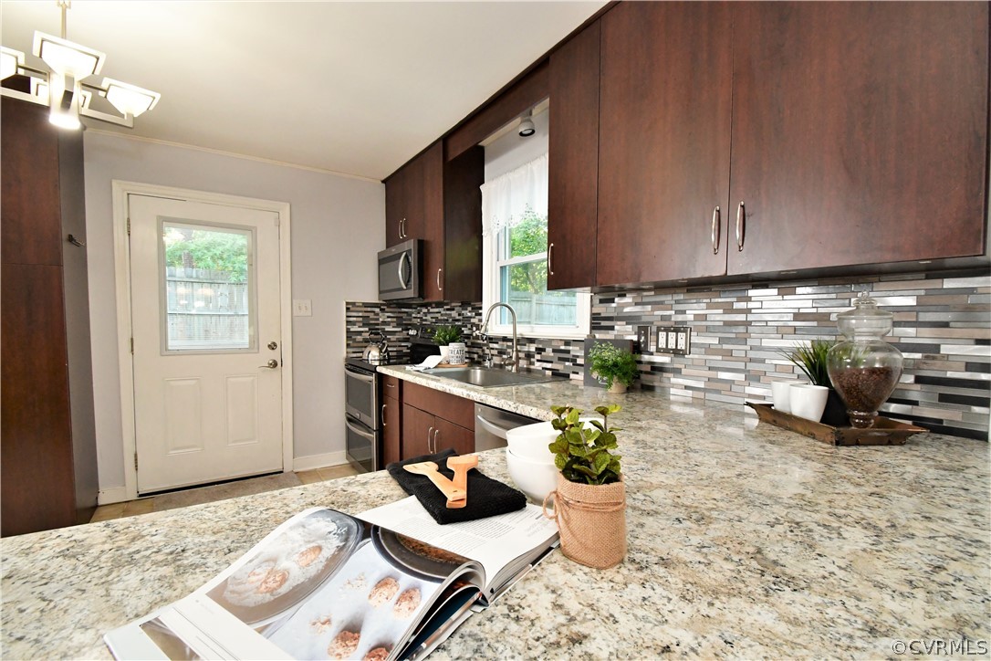 3940 Paulhill Road North Chesterfield, VA 23236 - Photo 8 of 48 Updated Kitchen with a Tile Backsplash and Stainle