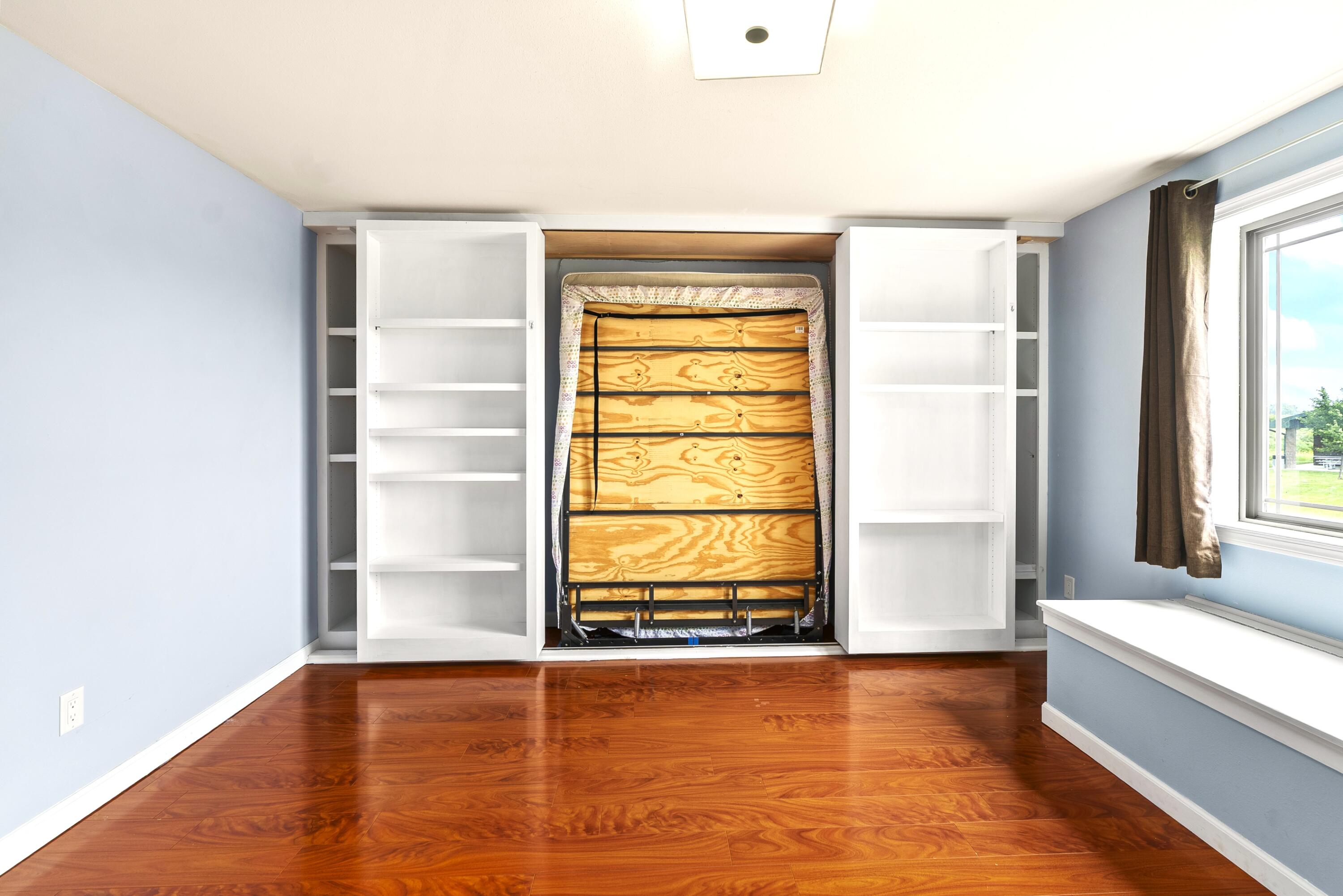 113 Community Drive Fall River, WI 53932 - Photo 29 of 40 Shelving + Murphy Bed!