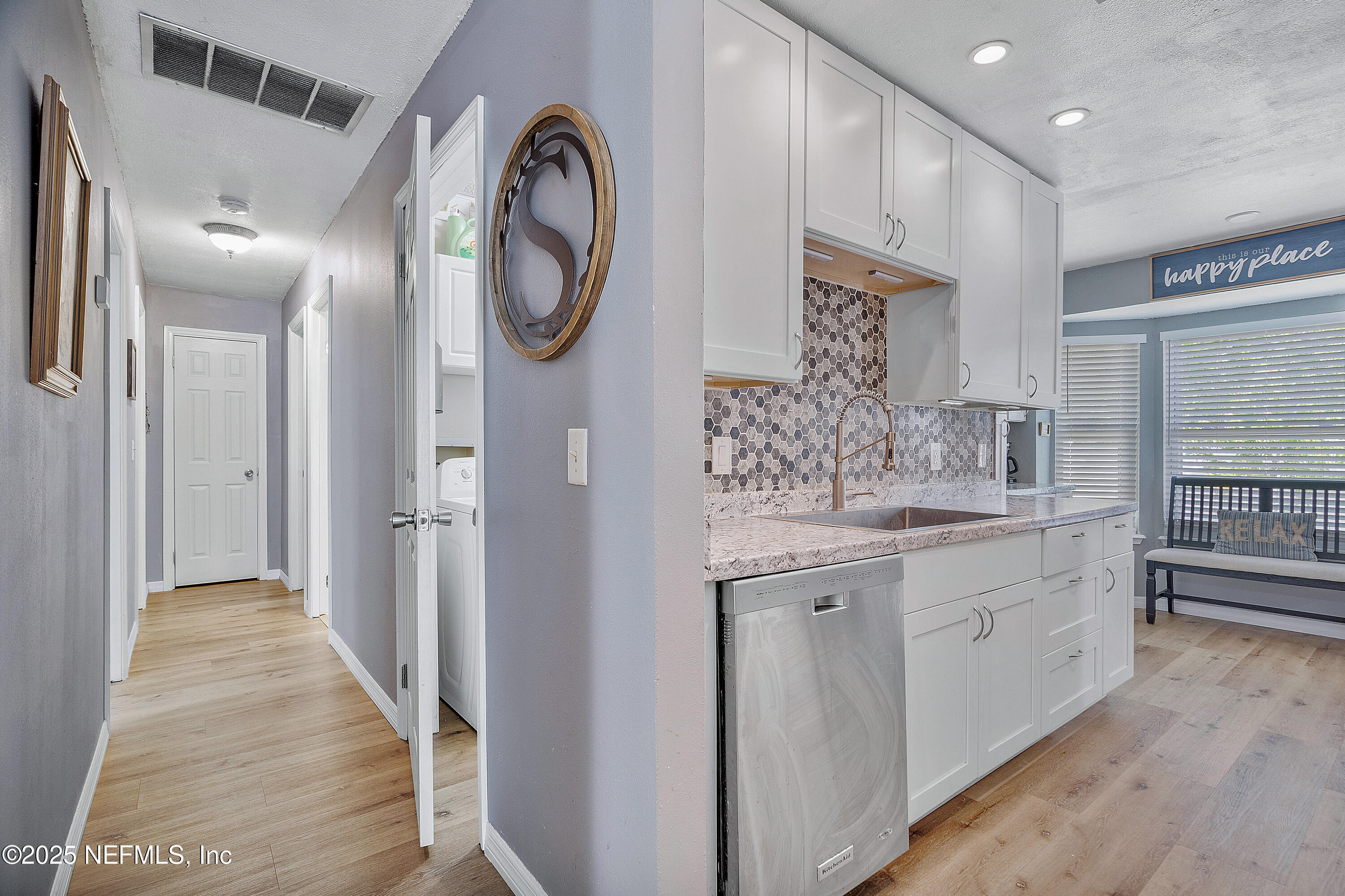 3657 Hartley Road Jacksonville, FL 32257 - Photo 18 of 29 kitchen to hall
