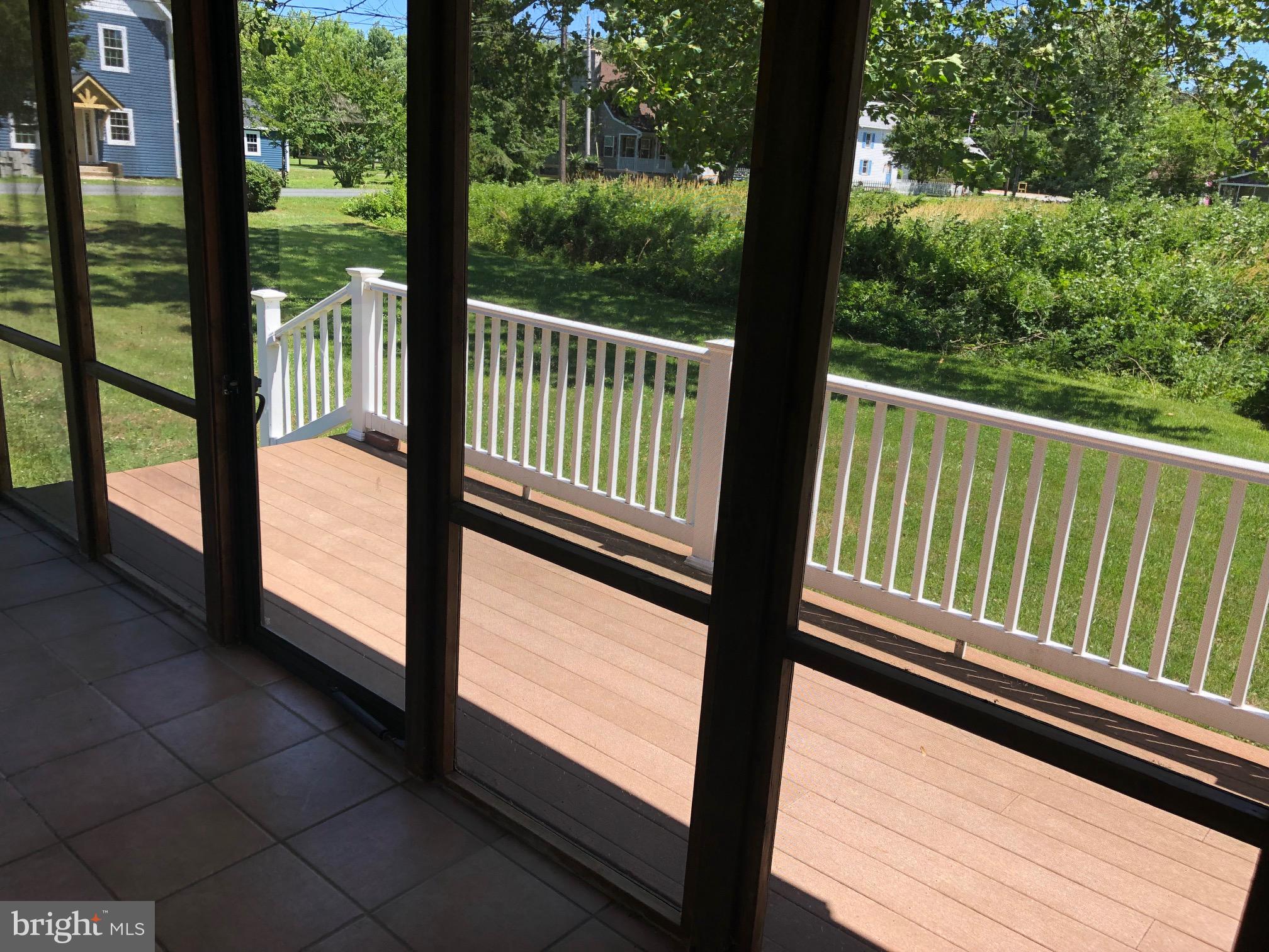 4728 Tyaskin Road Tyaskin, MD 21865 - Photo 17 of 48 From sunroom to deck walk area