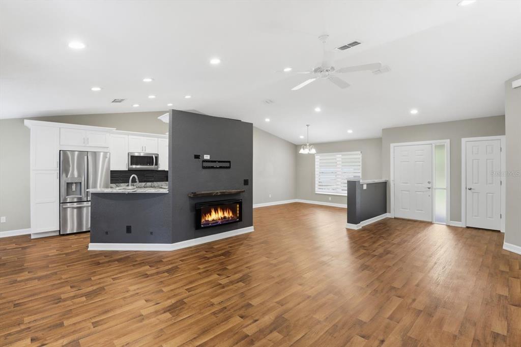 20781 Southwest 90th Loop Dunnellon, FL 34431 - Photo 2 of 46 a view of kitchen with furniture and wooden floor
