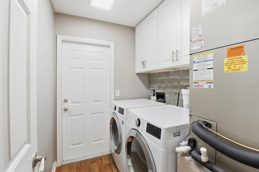 20781 Southwest 90th Loop Dunnellon, FL 34431 - Photo 26 of 46 a utility room with dryer and washer