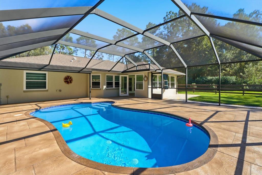 20781 Southwest 90th Loop Dunnellon, FL 34431 - Photo 27 of 46 a view of swimming pool with seating area