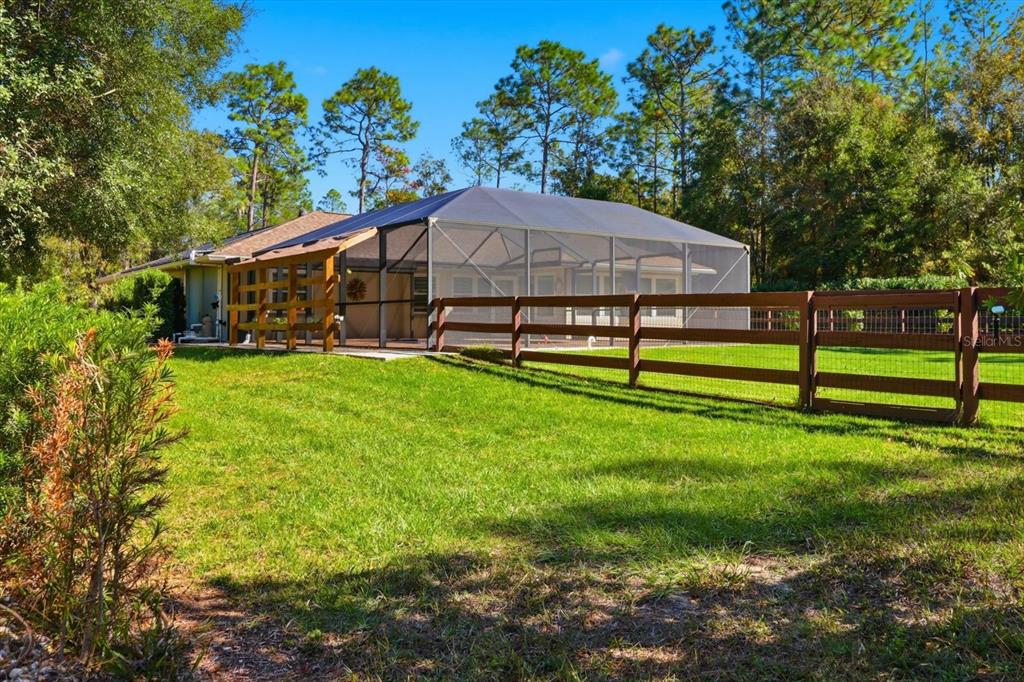 20781 Southwest 90th Loop Dunnellon, FL 34431 - Photo 36 of 46 a view of a house with a yard