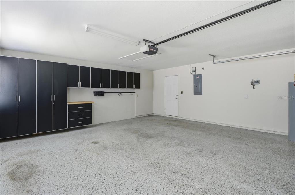 20781 Southwest 90th Loop Dunnellon, FL 34431 - Photo 44 of 46 a view of a kitchen with a sink and a refrigerator