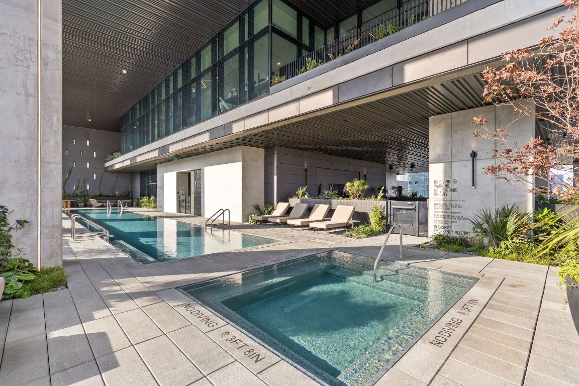 610 Davis Street, Unit 4008 Austin, TX 78701 - Photo 29 of 40 a view of a swimming pool with sitting area