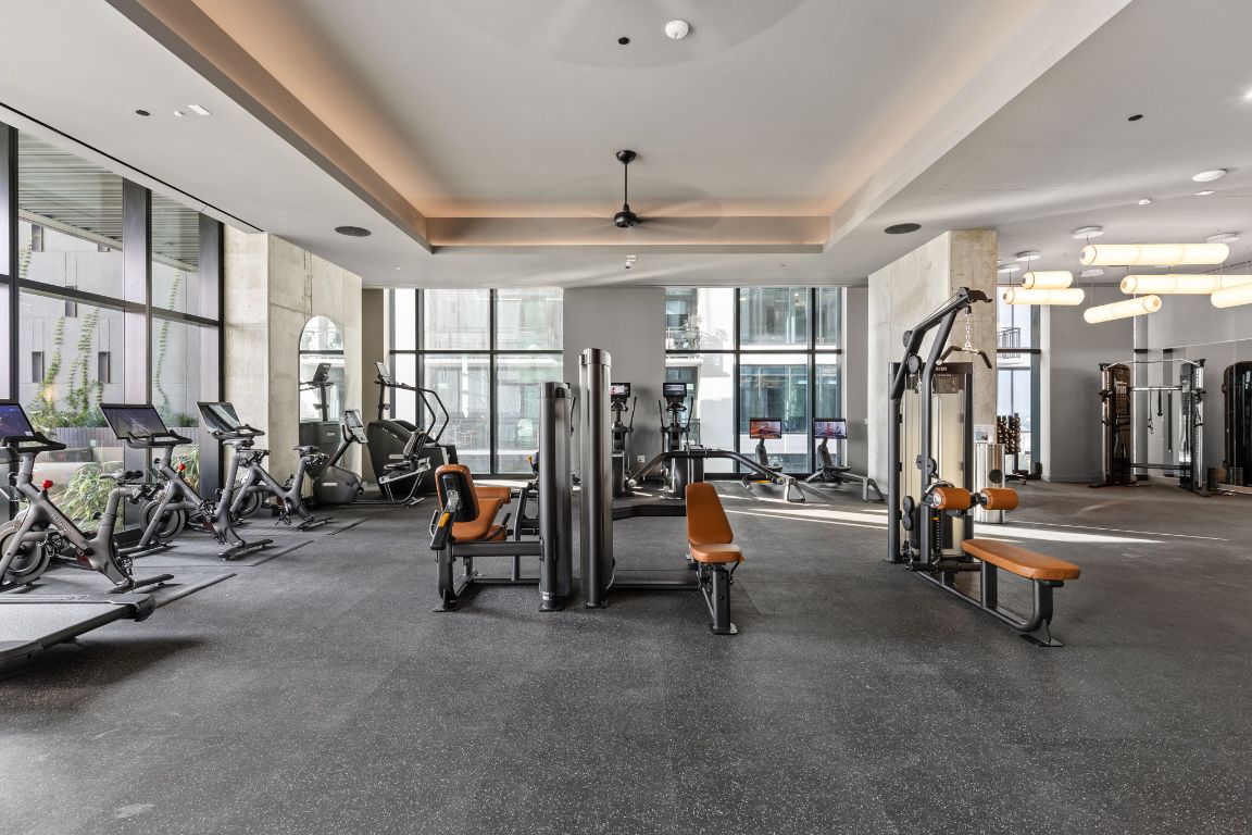 610 Davis Street, Unit 4008 Austin, TX 78701 - Photo 32 of 40 a view of a room with gym equipment