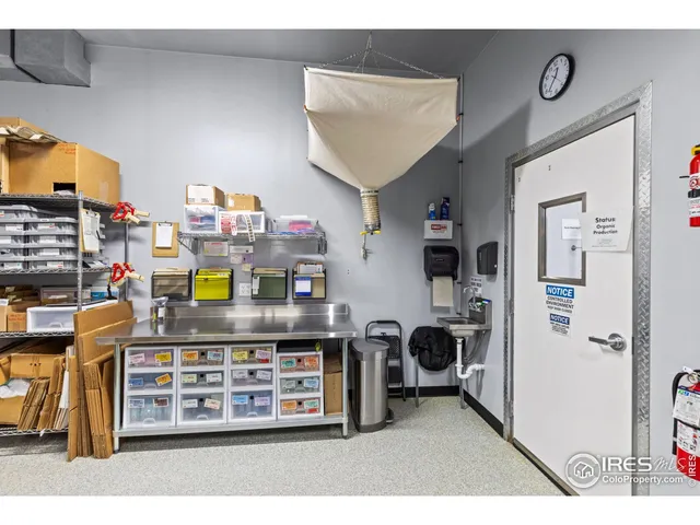 a picture of a living room with furniture and a window