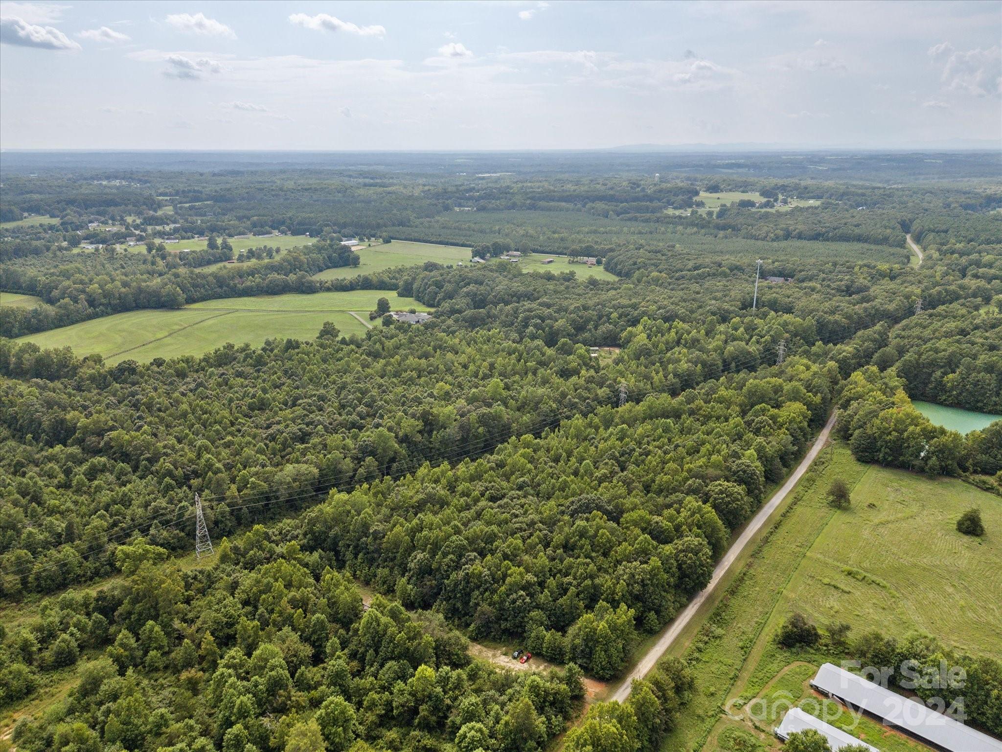 2198 County Line Road Kings Mountain, NC 28086 - Photo 6 of 7 a view of a yard with an ocean