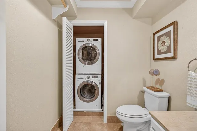 a bathroom with a toilet and a sink