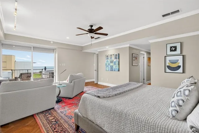 a bedroom with a bed furniture and a window