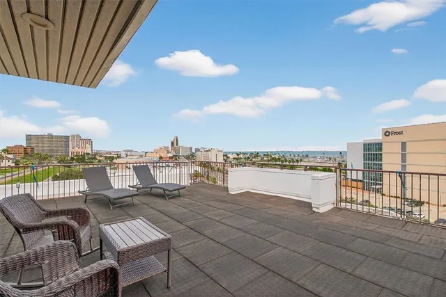 a view of a terrace with sitting area