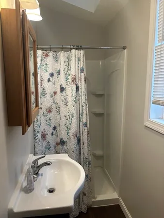 a white toilet sitting in a bathroom
