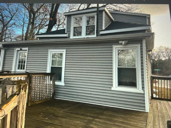 a view of a house with a deck
