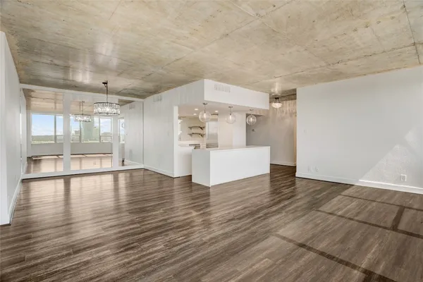 a view of a livingroom with wooden floor