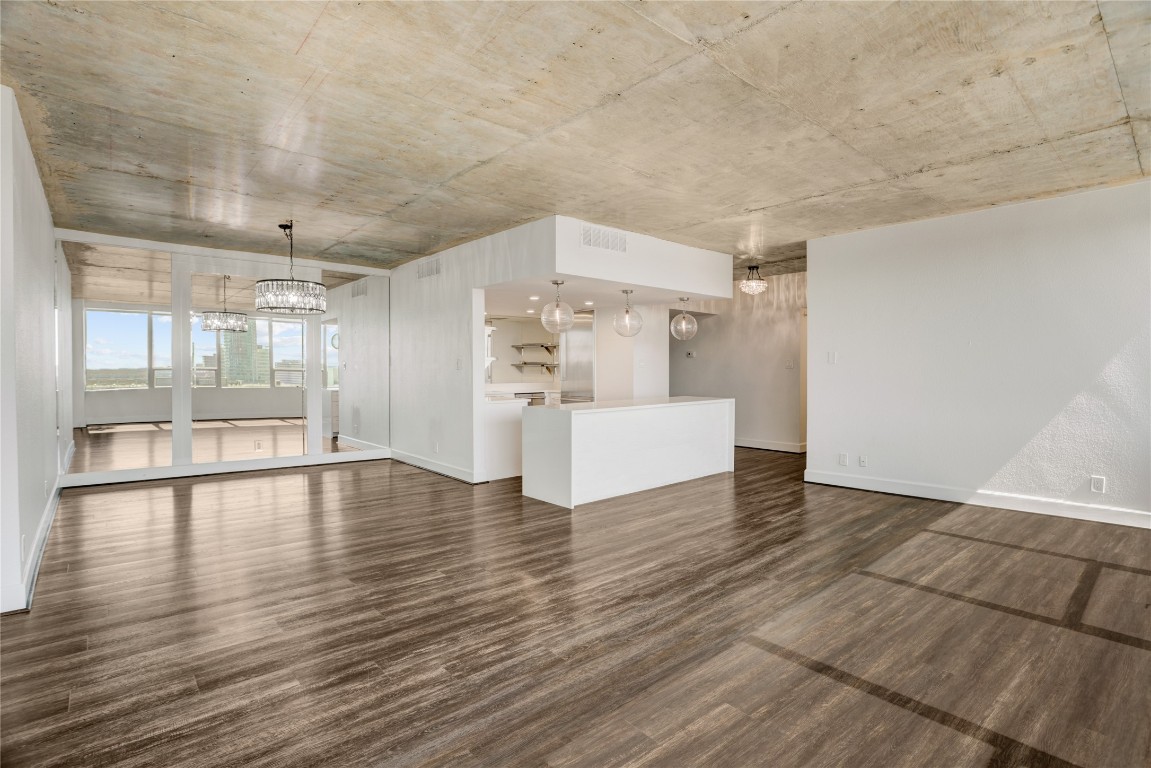 a view of a livingroom with wooden floor