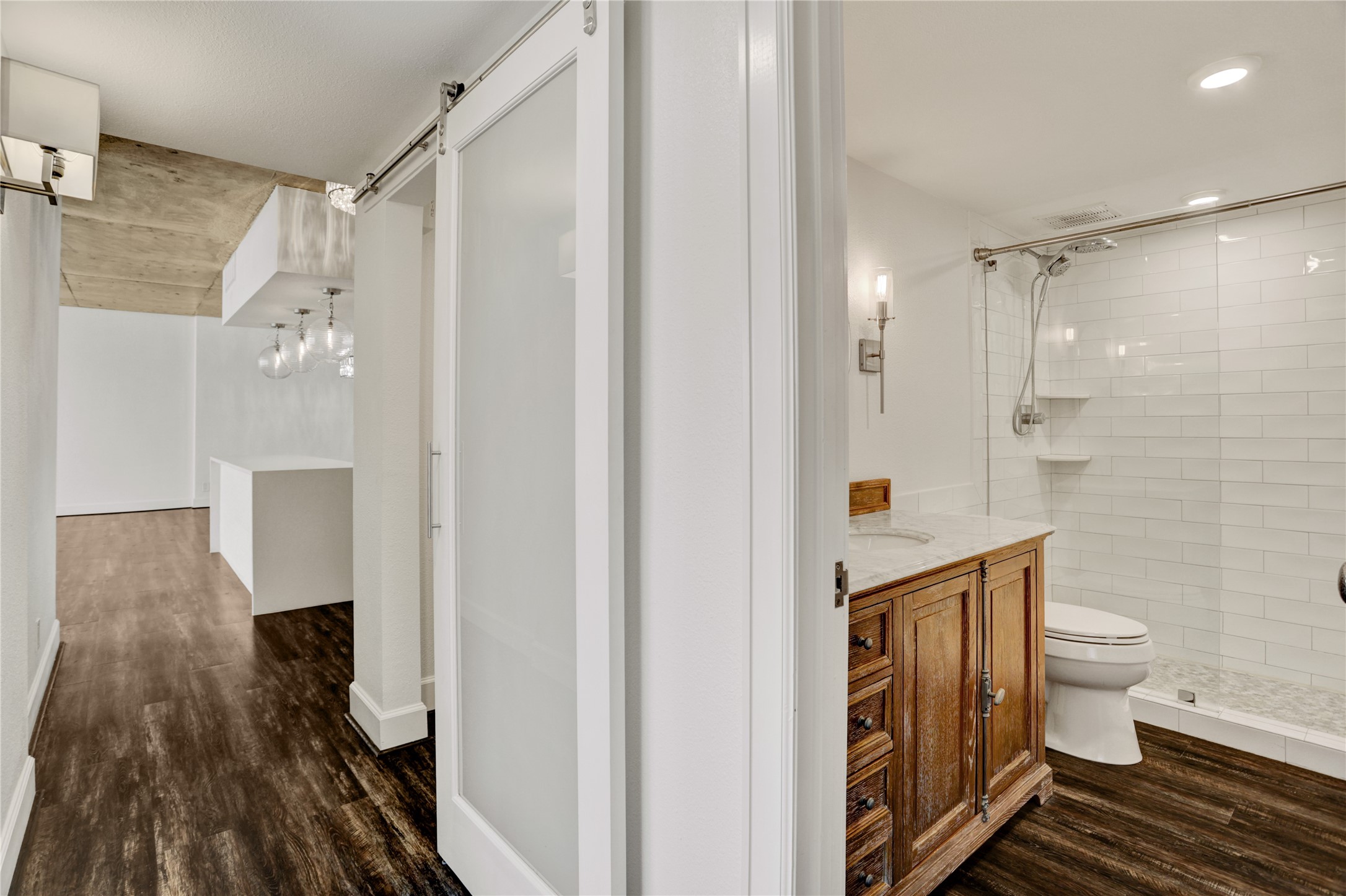 2701 Westheimer Road, Unit 12E Houston, TX 77098 - Photo 13 of 31 a bathroom with a toilet and a shower