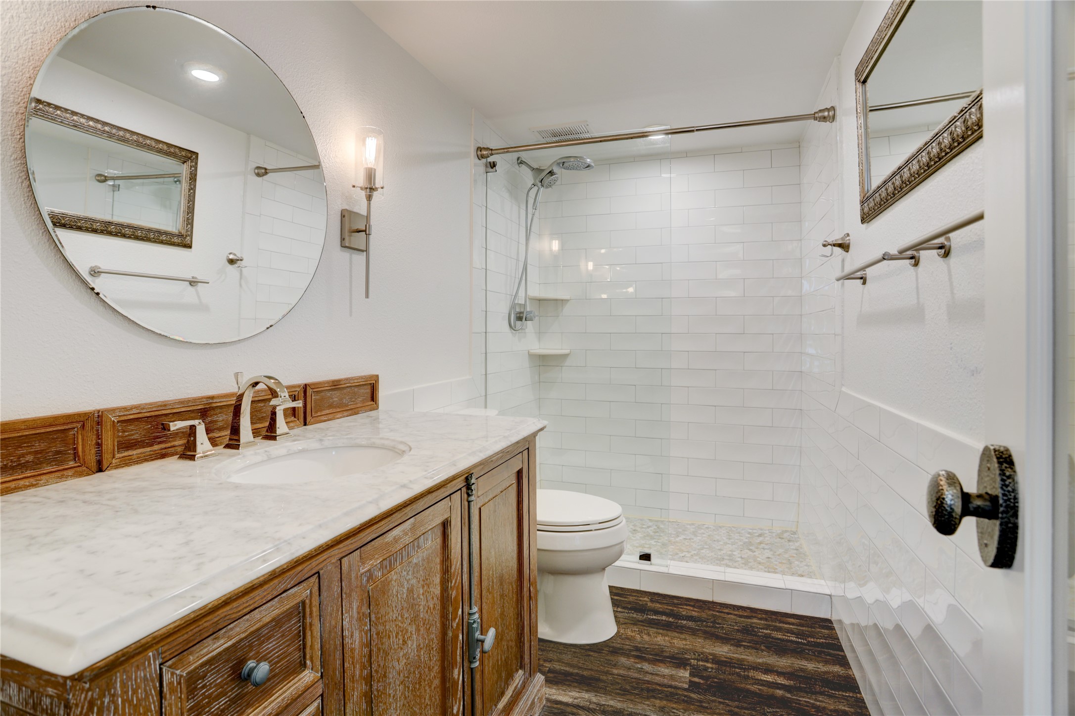 2701 Westheimer Road, Unit 12E Houston, TX 77098 - Photo 14 of 31 a bathroom with a sink a toilet and shower