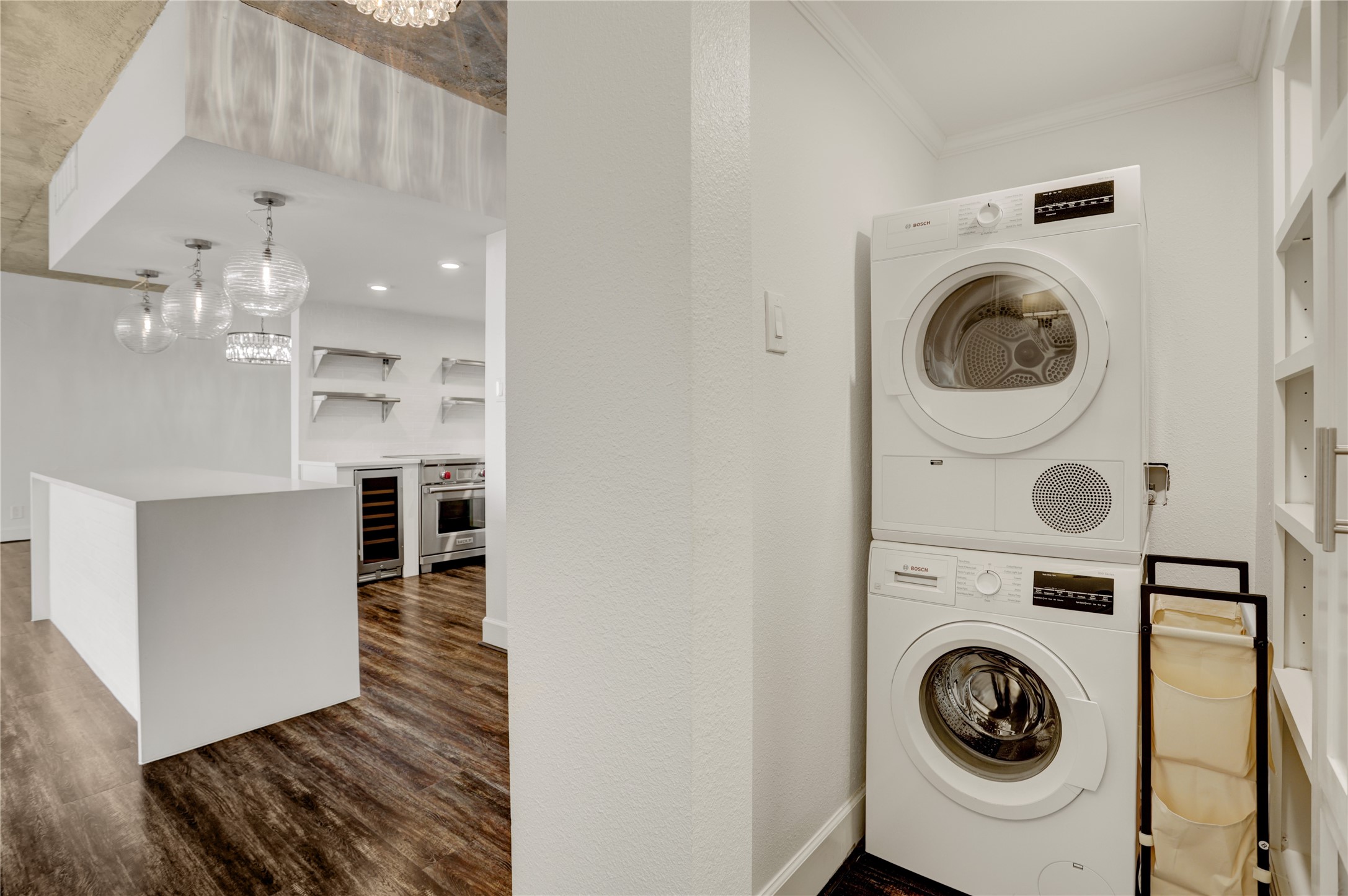 2701 Westheimer Road, Unit 12E Houston, TX 77098 - Photo 16 of 31 a view of a hallway with washer and dryer