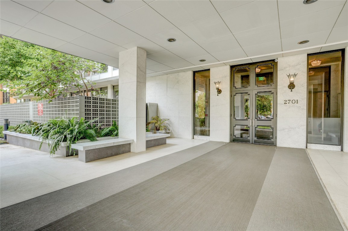 2701 Westheimer Road, Unit 12E Houston, TX 77098 - Photo 18 of 31 a view of an entryway with potted plants
