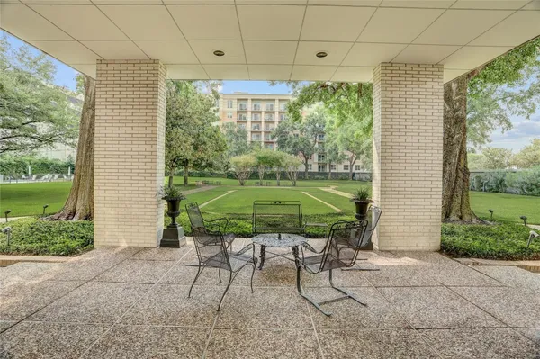 a garden view with a seating space