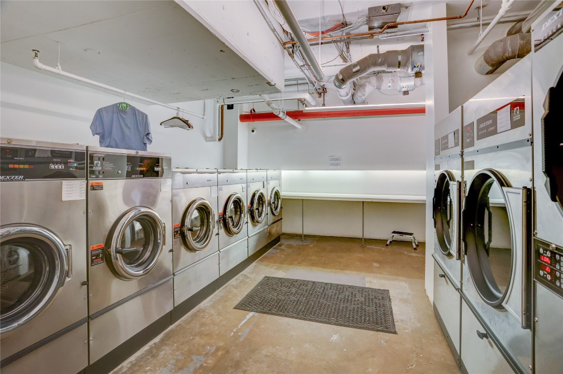 2701 Westheimer Road, Unit 12E Houston, TX 77098 - Photo 28 of 31 a utility room with dryer and washer